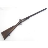 A French 19thC 16 bore Lefaucheux patent pinfire shotgun by Aury, St Etienne. 28'' Damascus barrels,