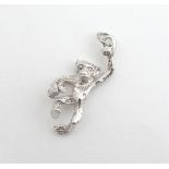 A novelty white metal pendant / charm formed as a chimp. ( unmarked - tests as silver) 1 1/4" long