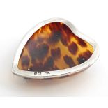 A tortoiseshell pin dish with silver mount hallmarked London 1898 maker J Batson & Son. 3" long