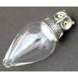 A 20thC novelty figural glass scent bottle in the form of an owl, with silver top marked Sterling, 2