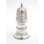 A silver pepper pot hallmarked Chester 1899 maker Stokes & Ireland Ltd. 3 1/2" high Please Note - we