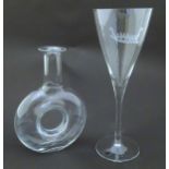Two items of Nordic/Scandinavian glassware, comprising a large wine glass and a decanter. The