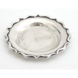 An Egyptian silver dish of circular form. 4 1/2" wide (68g) Please Note - we do not make reference