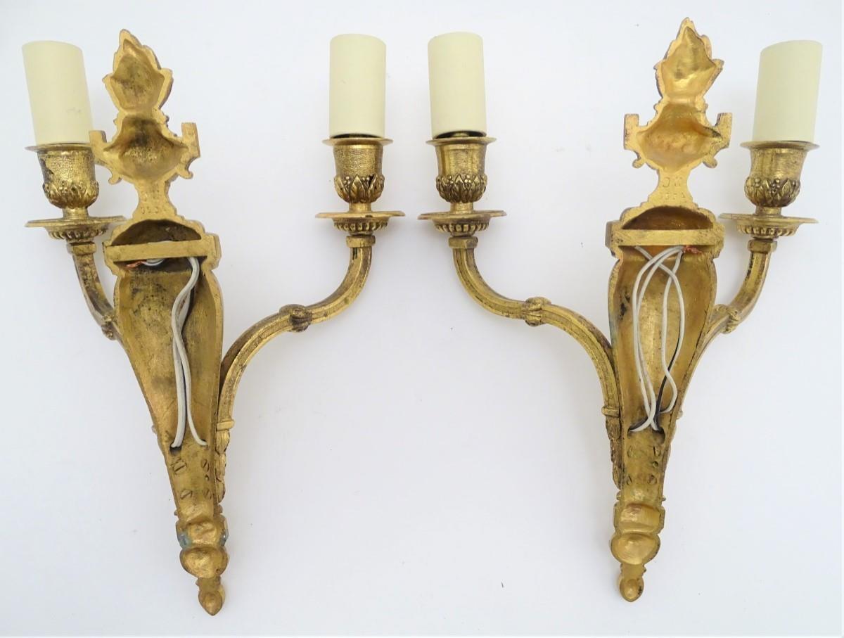 A pair of gilt metal twin branch wall sconces with flaming urn decoration. Together with four - Image 2 of 6