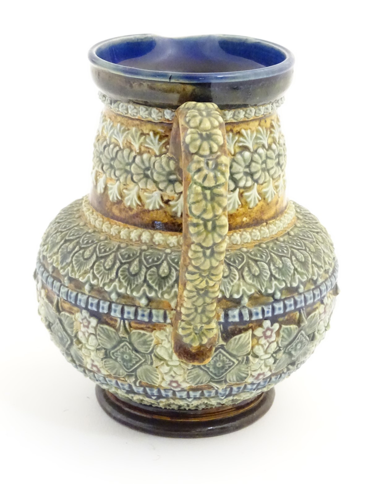 A 19thC Doulton Lambeth jug with a banded floral design in relief by Clara Baker. Doulton Lambeth - Image 6 of 7