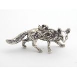 A Novelty Continental silver pendant / charm formed as a fox, German .800 silver 1/2" long Please