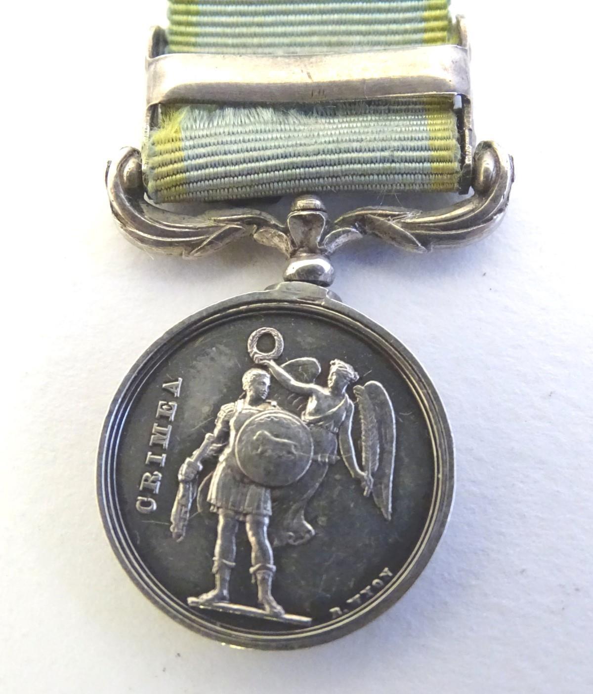 Militaria: a Victorian miniature Crimea Medal, with Sebastopol and Inkermann bars. 2" long ( - Image 2 of 7