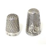 A silver thimble hallmarked Birmingham 1910 maker James Swann, together with a Continental silver