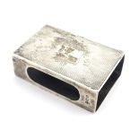 An Art Deco silver match box cover with engine turned decoration. Hallmarked London 1950 maker S J