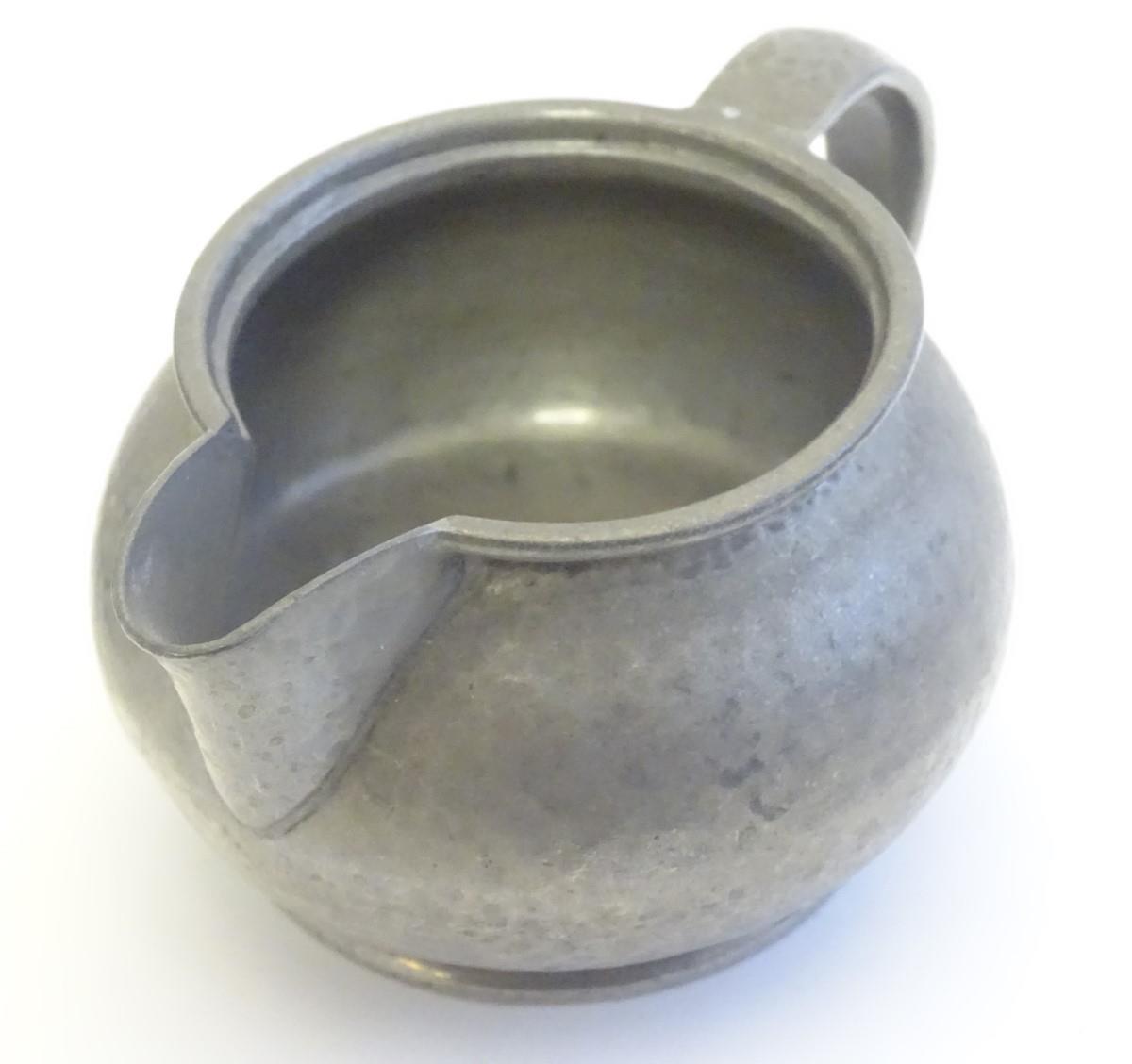An early 20thC pewter milk jug and sugar bowl designed by Archibald Knox for the Tudric range by - Image 10 of 13