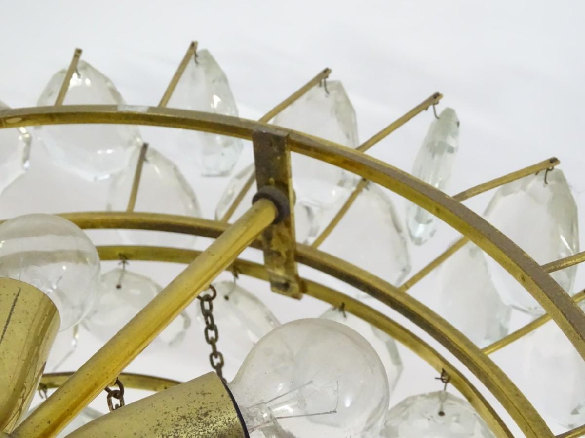 A mid 20thC Italian electrolier, having nine lights illuminating five tiers of glass droplets / - Image 3 of 7