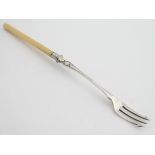 A late 19thC / early 20thC silver plate pickle fork. Approx. 9" long Please Note - we do not make
