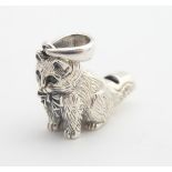 A novelty white metal whistle formed as a cat 3/4" high Please Note - we do not make reference to