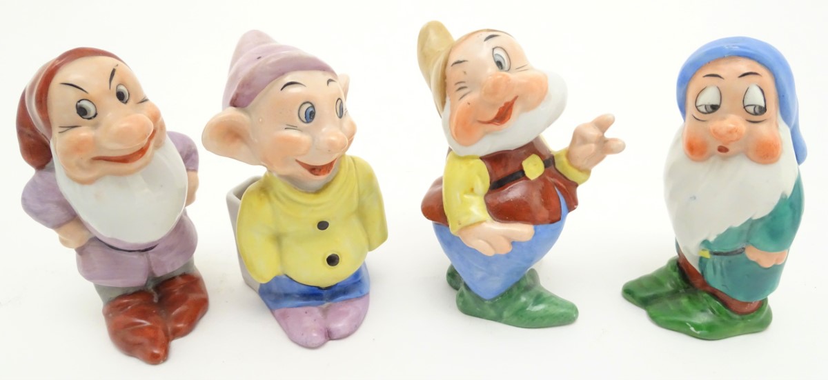 A mid-20thC ceramic novelty set of bud vases, formed as Snow White and the seven Dwarves. The - Image 7 of 9