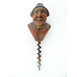 A Black Forest folk art novelty figural corkscrew, the carved handle formed as the bust of a