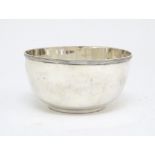 A silver bowl hallmarked Sheffield 1900 maker Atkin Brothers. 4 3/4" diameter (148g) Please Note -
