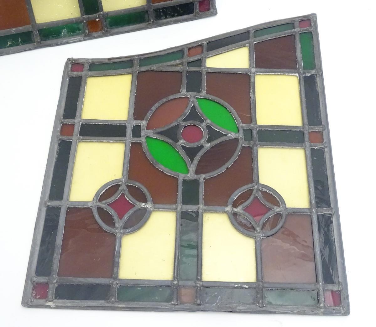 A pair of early 20thC lead and stained glass window / door panels, of irregular quadrilateral - Bild 5 aus 9