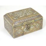 A Persian cedar lined table spice box of casket form, with inlaid white metal and copper