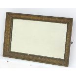 An early / mid 20thC rectangular mirror with a moulded surround and beadwork decoration. 23 1/2"