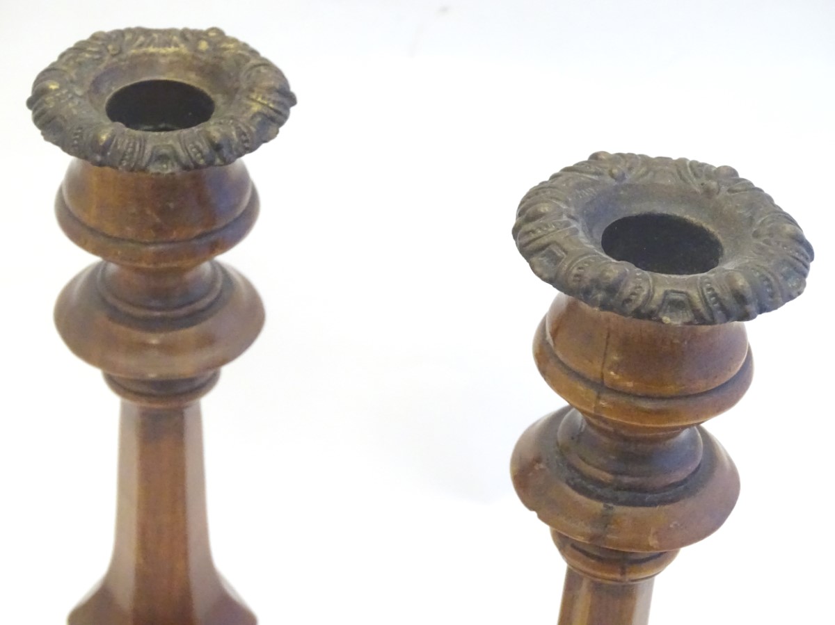 Treen: A pair of 19thC turned and carved wooden candlesticks with hexagonal bases. Approx. 10 3/4" - Image 7 of 8