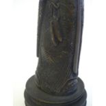 A Chinese resin Qing Dynasty figure with carved detail. Approx. 13" high. Please Note - we do not