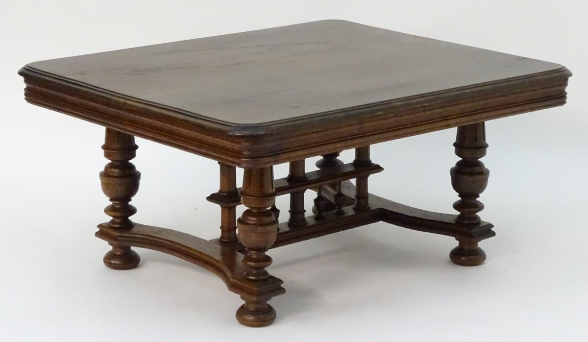 A 20thC oak table with a rectangular moulded top, four turned tapering legs with fluted decoration - Bild 5 aus 6