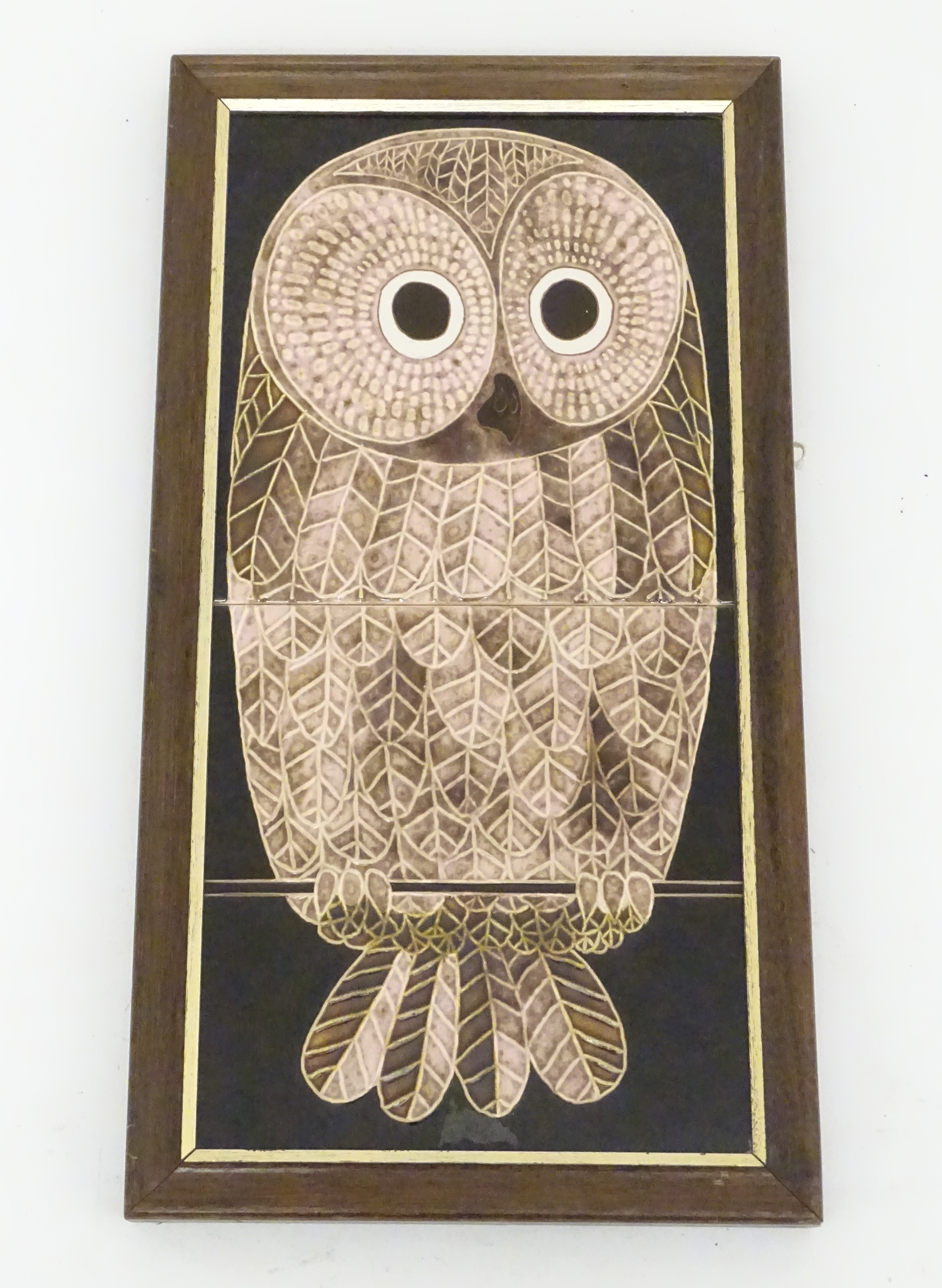 A framed MAW and Co tubeline and majolica hand decorated painted tile picture depicting an owl,