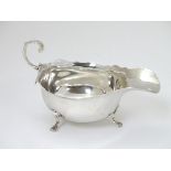 A silver sauce boat hallmarked London 1904 and stamped ' Mappin Brothers 220 Regent St. W.' 5 3/4"
