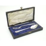 A silver christening set comprising fork and spoon hallmarked Sheffield 1947 maker C.E. Cased.