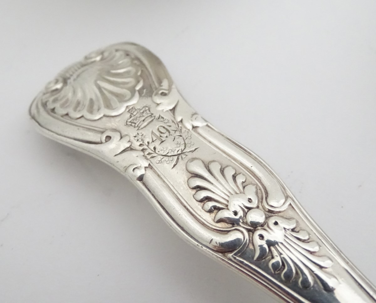 A set of 11 Geo IV silver kings pattern table spoons . Hallmarked London 1828 maker William - Image 7 of 15