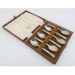 Kitchenalia: a boxed set of six art deco electro plated nickel silver teaspoons, each 4 1/8" long