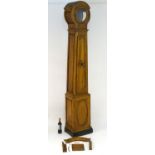 A continental 19thC cherry wood longcase clock (case only), with lenticel glass and a long door, 8''