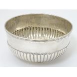 Chinese export silver : A white metal bowl marked 'Wang Hing' 5'' diameter x 2 3/4'' high Please