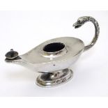 A silver table lighter / cigar lighter in the form of a Roman lamp . Hallmarked Birmingham 1924