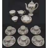 A quantity of Wedgwood tea / coffee wares in the pattern Hathaway Rose, with floral and foliate