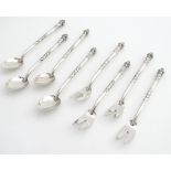 A four place (4+4) Continental white metal (.900 silver) pastry / cake forks and spoons, with