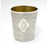 A French silver beaker with engraved decoration maker Henin et Cie. 3" high Please Note - we do