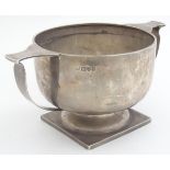 A silver twin handled trophy cup engraved ' the Gun Tug of war cup' hallmarked Chester 1923 6"