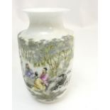A Chinese vase with flared rim, depicting oriental male figures in an outdoor scene across body