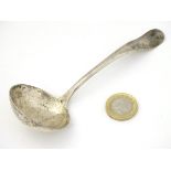 A silver sauce ladle hallmarked Sheffield 1909 maker Martin Hall & Co. 5 ¾" long Please Note - we do
