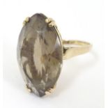 A vintage retro 9ct gold ring set with large marquise cut smoky quartz. London c.1964. Ring size