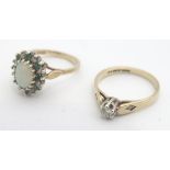 2 gold rings, one 9ct set with central diamonds with 2 further diamonds set to shoulders. Size