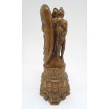 A 20thC carved wooden sculpture titled Tragic Muse to base, monogrammed TD and dated 1971 to side.