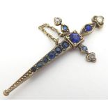 A late 19thC / early 20thC brooch / clasp? formed as a sword / dagger set with blue and white