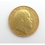 A 22ct gold 1909 Edward VII half sovereign coin, approximately 4g Please Note - we do not make