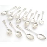 A set of 11 Geo IV silver kings pattern table spoons . Hallmarked London 1828 maker William
