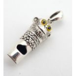 A novelty white metal whistle with chimp / monkey head decoration. Approx. 1 1/4" long Please Note -