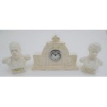 Commemorative Geo V clock : a plaster clock and garnitures of King George V and Queen Mary , the