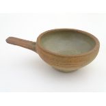 A Leach Pottery, St. Ives, stoneware egg baker / ramekin with a single handle. Impressed studio