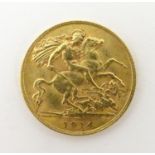 A 1914 gold George V half sovereign coin. Approx. weight 4g Please Note - we do not make reference